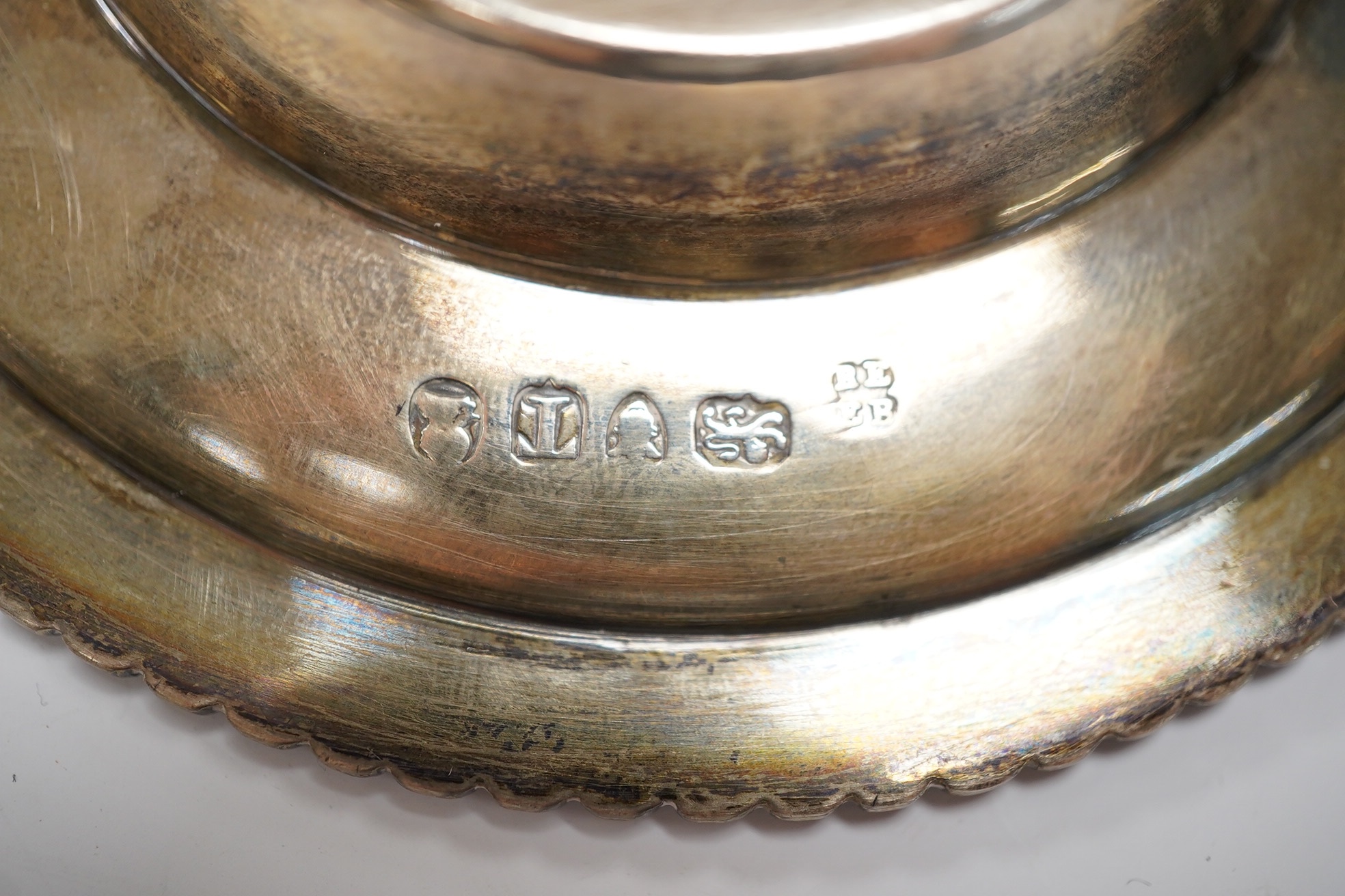 A pair of George III silver dishes or stands, with gadrooned borders, Emes & Barnard, London, 1814, diameter 10.9cm, 5.3oz.